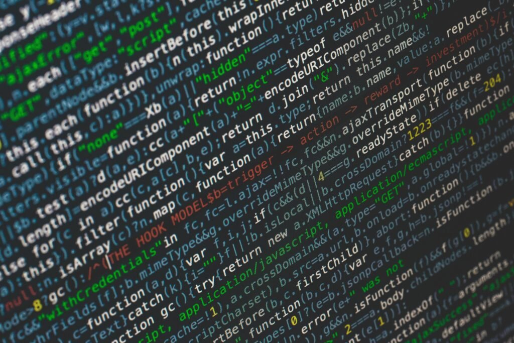 Close-up of colorful programming code displayed on a computer screen.
